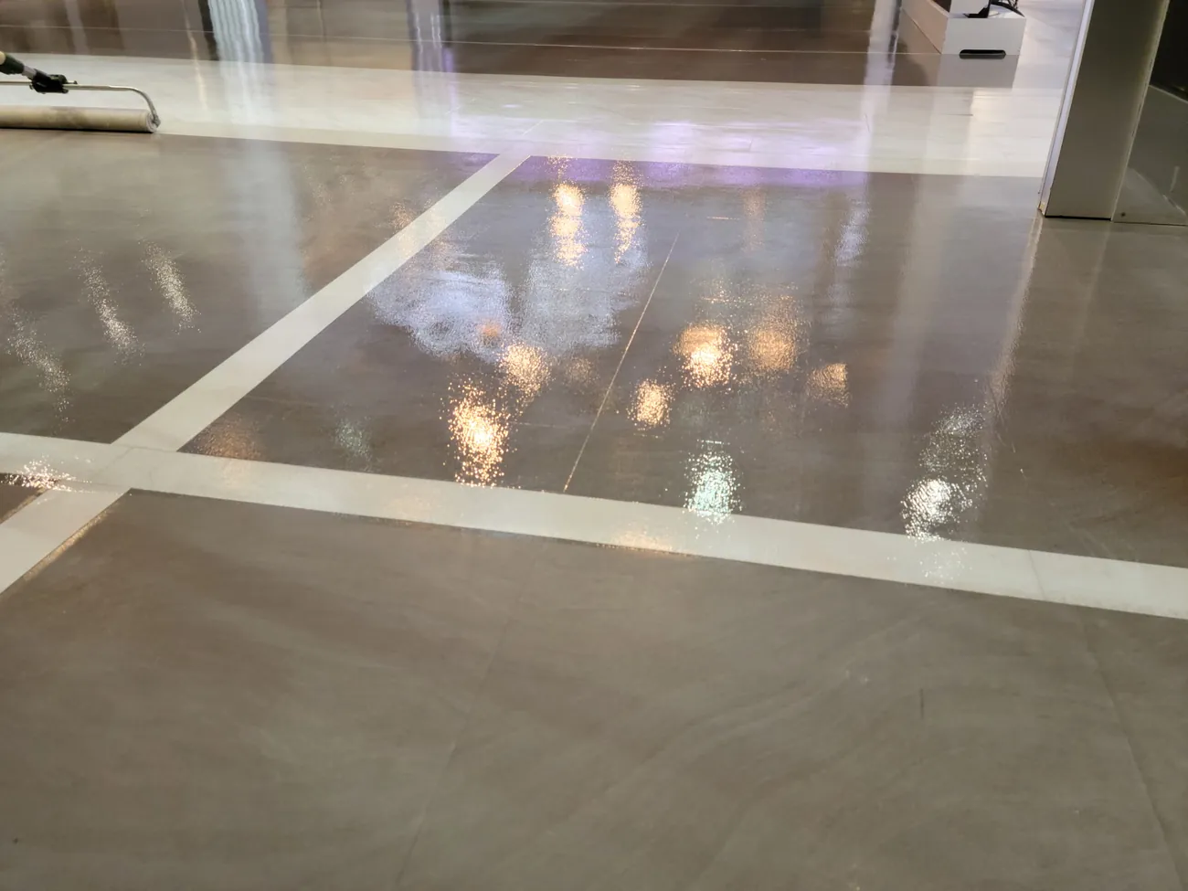 Close view of the glossy clear coat over light inlay lines